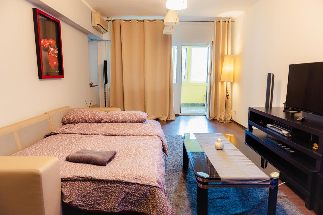 Comfy Apartment With Private Parking And Netflix บูคาเรสต์ ภายนอก รูปภาพ